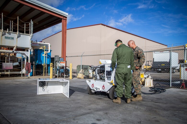U.S. Marines with Marine Aviation Logistics Squadron (MALS) 13, marine aviation maintenance, conduct routine maintenance and inspections on gear and equipment on Marine Corps Air Station Yuma, Ariz., Nov. 20, 2019. MALS-13 is a tenant squadron aboard MCAS Yuma who's mission is to provide aviation support, guidance, and direction to the Marine Aircraft Group Squadrons. (U.S. Marine Corps photo by Lance Cpl John Hall)