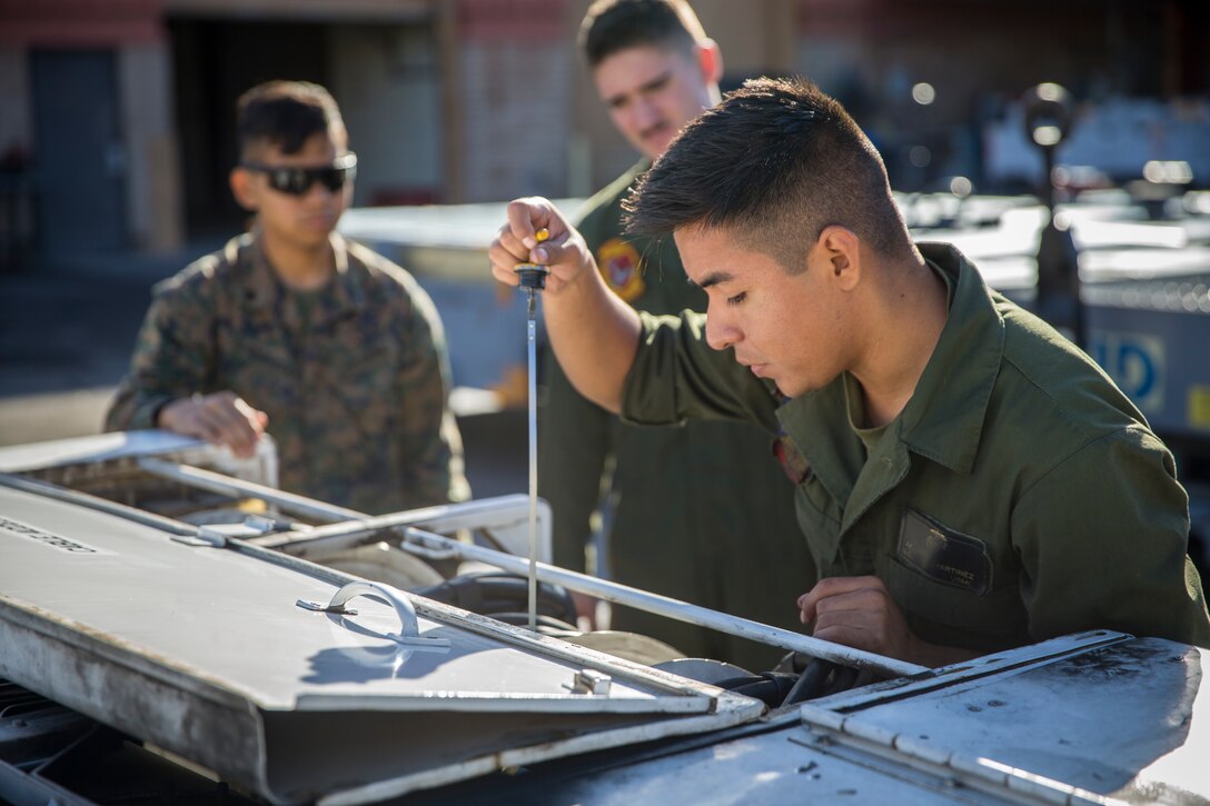 U.S. Marines with Marine Aviation Logistics Squadron (MALS) 13, marine aviation maintenance, conduct routine maintenance and inspections on gear and equipment on Marine Corps Air Station Yuma, Ariz., Nov. 20, 2019. MALS-13 is a tenant squadron aboard MCAS Yuma who's mission is to provide aviation support, guidance, and direction to the Marine Aircraft Group Squadrons. (U.S. Marine Corps photo by Lance Cpl John Hall)