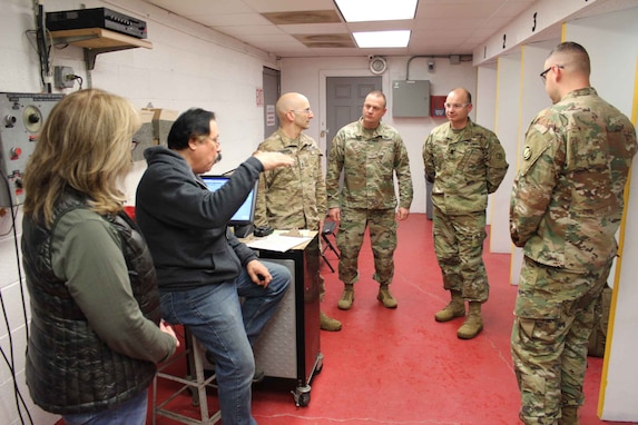 Match Officials (left) at the Southport Gun Club brief Sgt. 1st Class Rosendorn, Maj. Zizkovsky, Cmd. Sgt. Maj. Fall, and Master Sgt. Brunet during their Open Sectional Indoor Pistol Championship. Events like this are open to the public and held around the country. All Army Reserve Soldiers can benefit by attending.