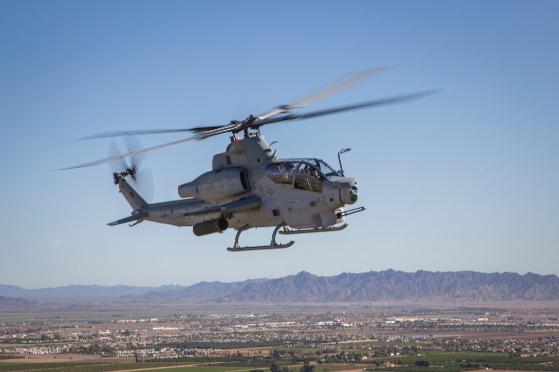 U.S. Marines with Marine Test and Evaluation Squadron One (VMX-1) conduct a live fire training exercise with the AH-1Z Cobra and F-35B Lightning II in Yuma, Ariz., Nov. 26, 2019. VMX-1 is an operational test squadron that tests multiple aircraft, allowing for the continuation of safety improvements, aircraft reliability, and overall lethality of Marine Corps aircraft. (U.S. Marine Corps photo by Lance Cpl. John Hall)