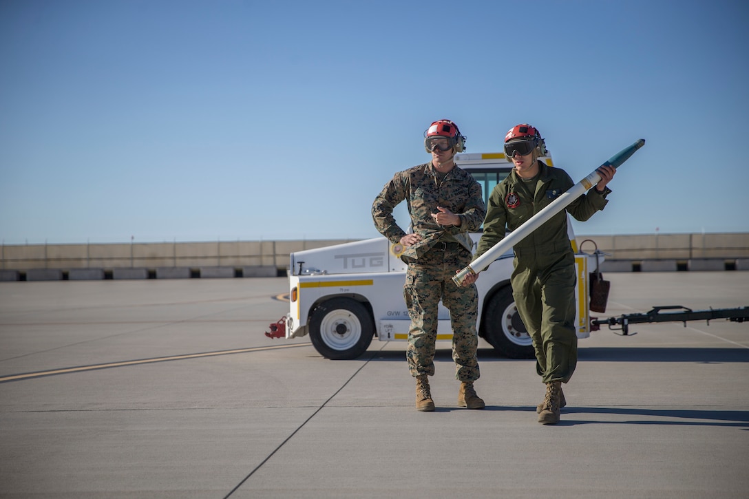 U.S. Marines with Marine Test and Evaluation Squadron One (VMX-1) conduct a live fire training exercise with the AH-1Z Cobra and F-35B Lightning II in Yuma, Ariz., Nov. 26, 2019. VMX-1 is an operational test squadron that tests multiple aircraft, allowing for the continuation of safety improvements, aircraft reliability, and overall lethality of Marine Corps aircraft. (U.S. Marine Corps photo by Lance Cpl. John Hall)