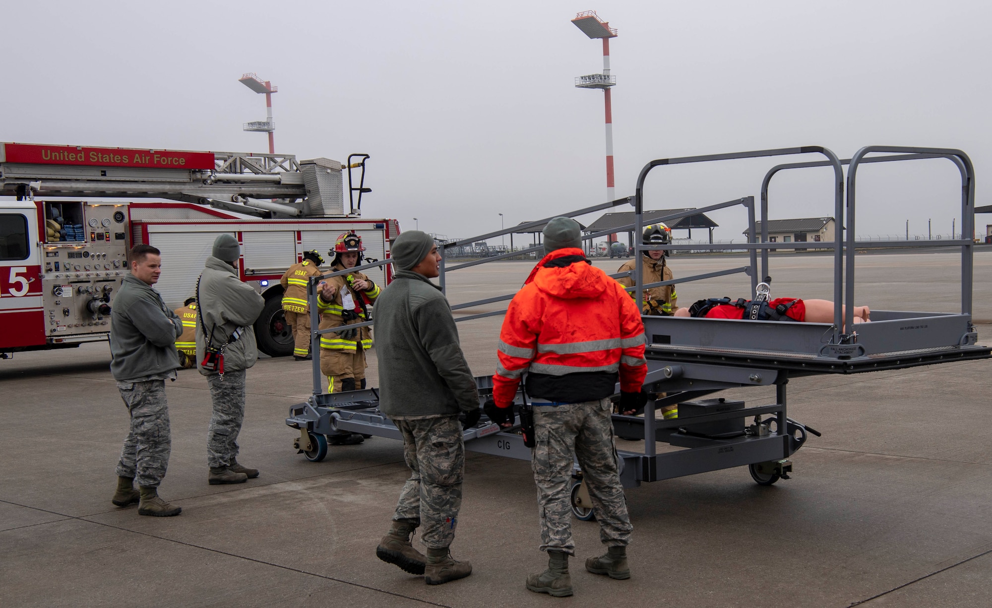 U.S. Air Force firefighters from the 52nd Civil Engineer Squadron arrive in response to a fall protection exercise at Spangdahlem Air Base, Germany, Jan. 23, 2020. The exercise was designed to help Airmen be better prepared to respond to life-threatening emergencies. (U.S. Air Force photo by Senior Airman Kyle Cope)
