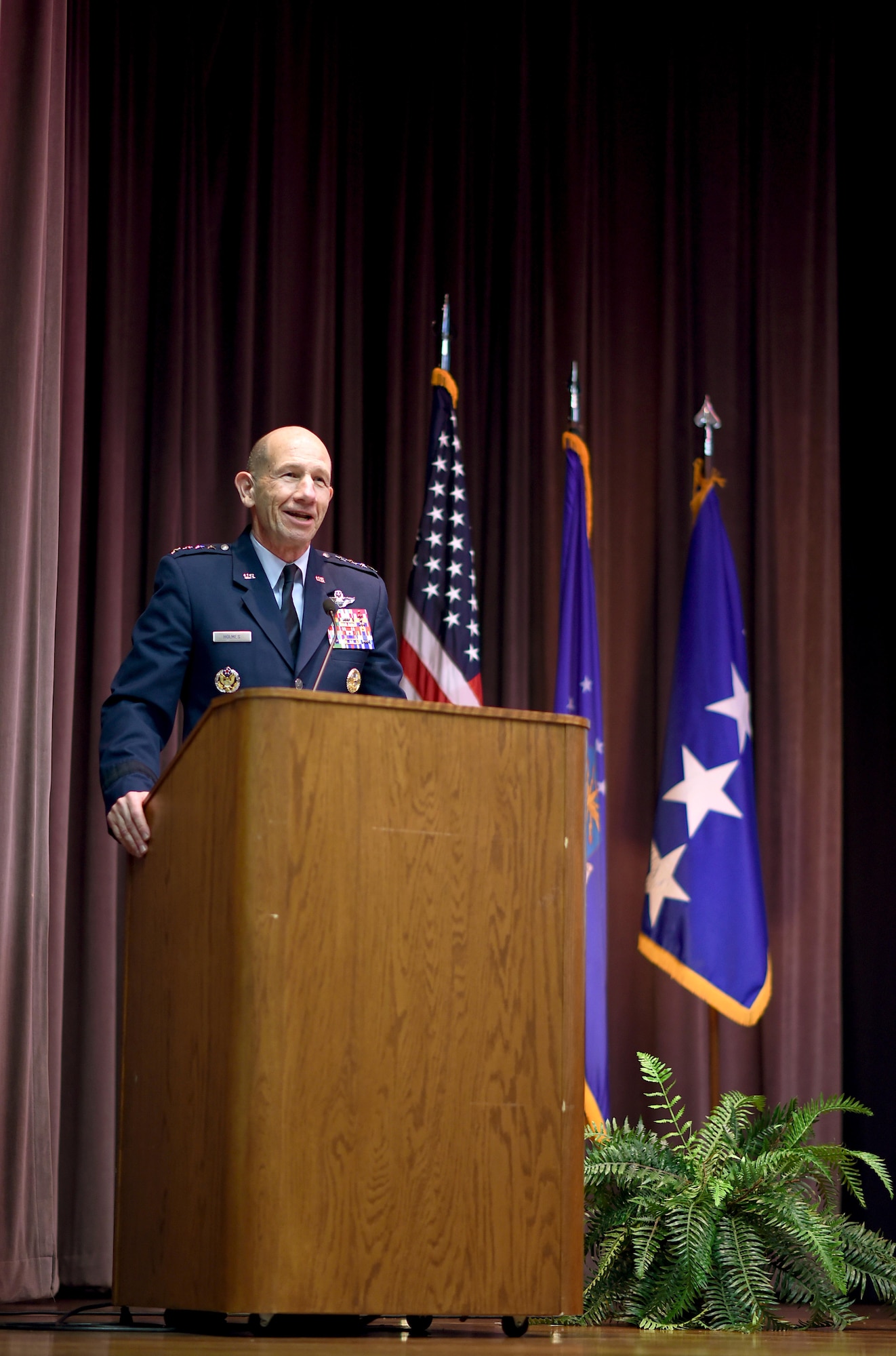 U.S. Air Force Gen. Mike Holmes, the commander of Air Combat Command, speaks at the graduation ceremony of Specialized Undergraduate Pilot Training Class 20-06/07 Jan. 24, 2020, on Columbus Air Force Base, Mississippi. Holmes graduated from Columbus AFB as a student pilot in 1982 and later became the 14th Operations Group commander at Columbus AFB from 2002-2004. (U.S. Air Force photo by Senior Airman Keith Holcomb)