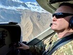 U.S. Air Force Lt. Col. Carl Miller, 538th Air Expeditionary Advisory Squadron commander, flies a C-208 Caravan over northern Afghanistan in this undated photo. Miller was named a 2019 Lance P. Sijan United States Air Force Leadership Award winner in the senior officer category. (Courtesy Photo)