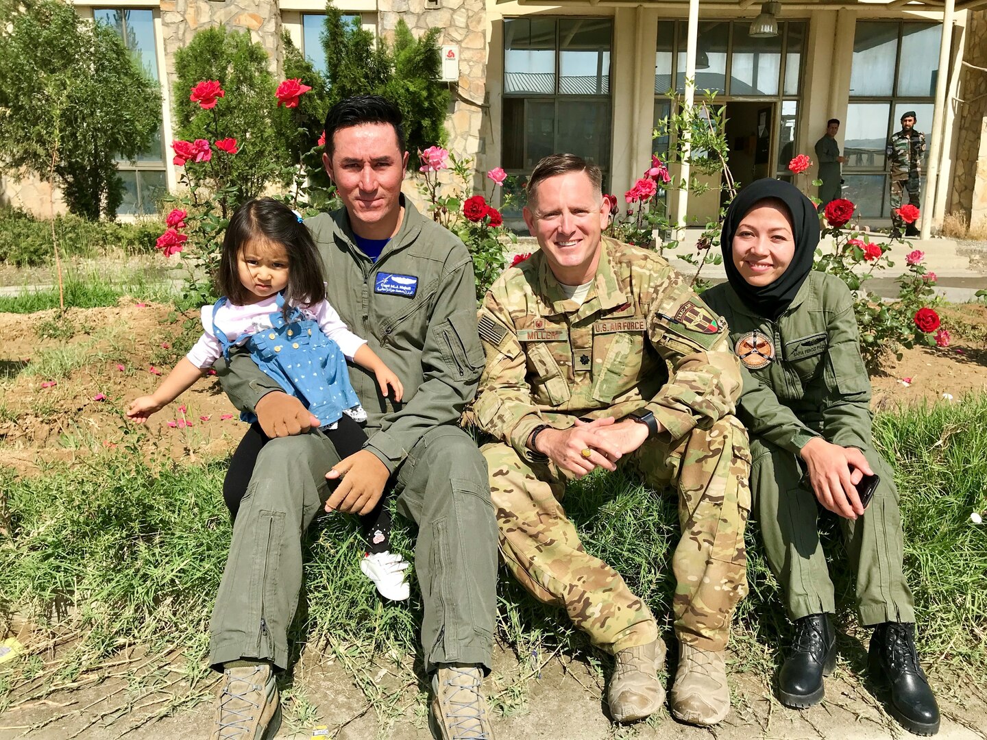 U.S. Air Force Lt. Col. Carl Miller (center), 538th Air Expeditionary Advisory Squadron commander, with married Afghan air force pilots at Hamid Karzai International Airport in Kabul, Afghanistan in May 2019. Miller was named a 2019 Lance P. Sijan United States Air Force Leadership Award winner in the senior officer category. (Courtesy Photo)