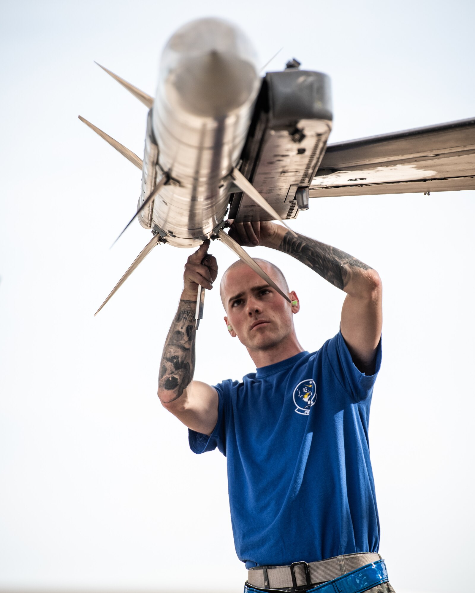 Senior Airman Sean Warden, 309th Aircraft Maintennance Squadron, weapons load crew member, inspects an AIM-120 missle during an Annual Load Crew Competition Jan. 24, 2020, at Luke Air Force Base, Ariz.