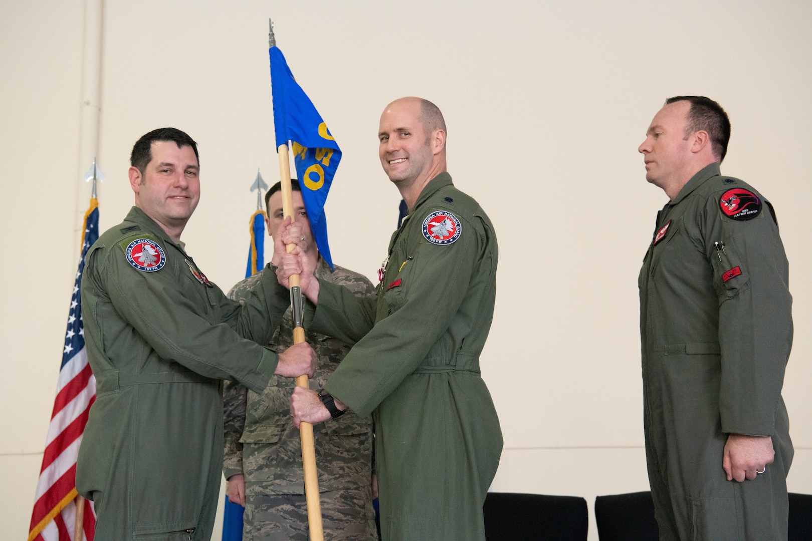 Airmen at a change of command ceremony