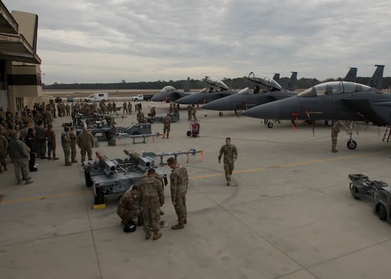 Airmen from the 4th Maintenance Group compete in a quarterly Load Crew Competition