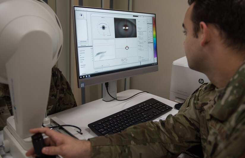 U.S. Air Force Senior Airman Alexander Peterson, 633rd Aerospace Medical Squadron ophthalmic technician, views a patient’s eye using a diagnostic tool called a pentacam at Joint Base Langley-Eustis, Virginia, Jan. 27, 2020. The optometry clinic at JBLE sees 30-50 patients each day depending on real-world situations. (U.S. Air Force photo by Airman 1st Class Sarah Dowe)