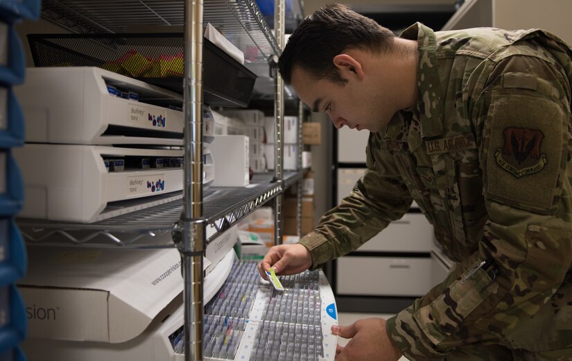 U.S. Air Force Senior Airman Alexander Peterson, 633rd Aerospace Medical Squadron ophthalmic technician, inspects expiration dates on contact lenses at Joint Base Langley-Eustis, Virginia, Jan. 27, 2020. The optometry clinic plays an important role in the Aircrew Soft Contact Lens Program which ensures pilots who wear contact lenses are supplied with the best prescription and have a matching set of glasses. (U.S. Air Force photo by Airman 1st Class Sarah Dowe)
