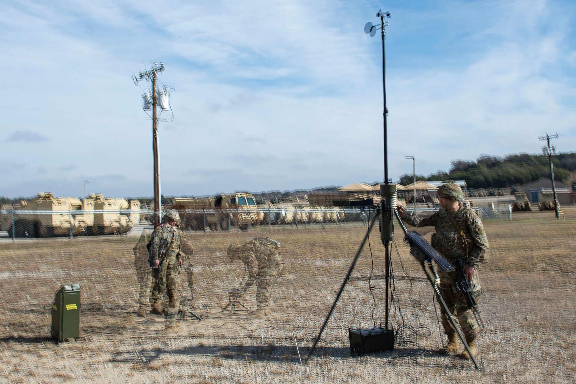 Photo of Airmen assigned to the 3d Weather Squadron set up a tactical meteorological observation system during a certification field exercise.