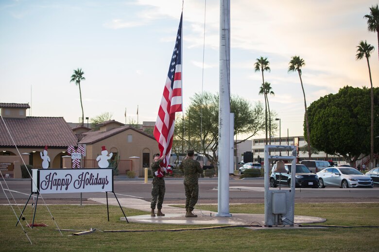 U.S. Marines, Sailors, and their families partake in holiday festivities during the Happy Holidays from Yuma event on the Marine Corps Air Station (MCAS) Yuma Parade Field, Dec. 12, 2019. The event was hosted by MCCS and provided participants with the opportunity to get photos with Santa, eat food, and enjoy holiday music. (U.S. Marine Corps photo by Lance Cpl John Hall)