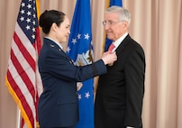 Retiring civilian honored for 33 years of service