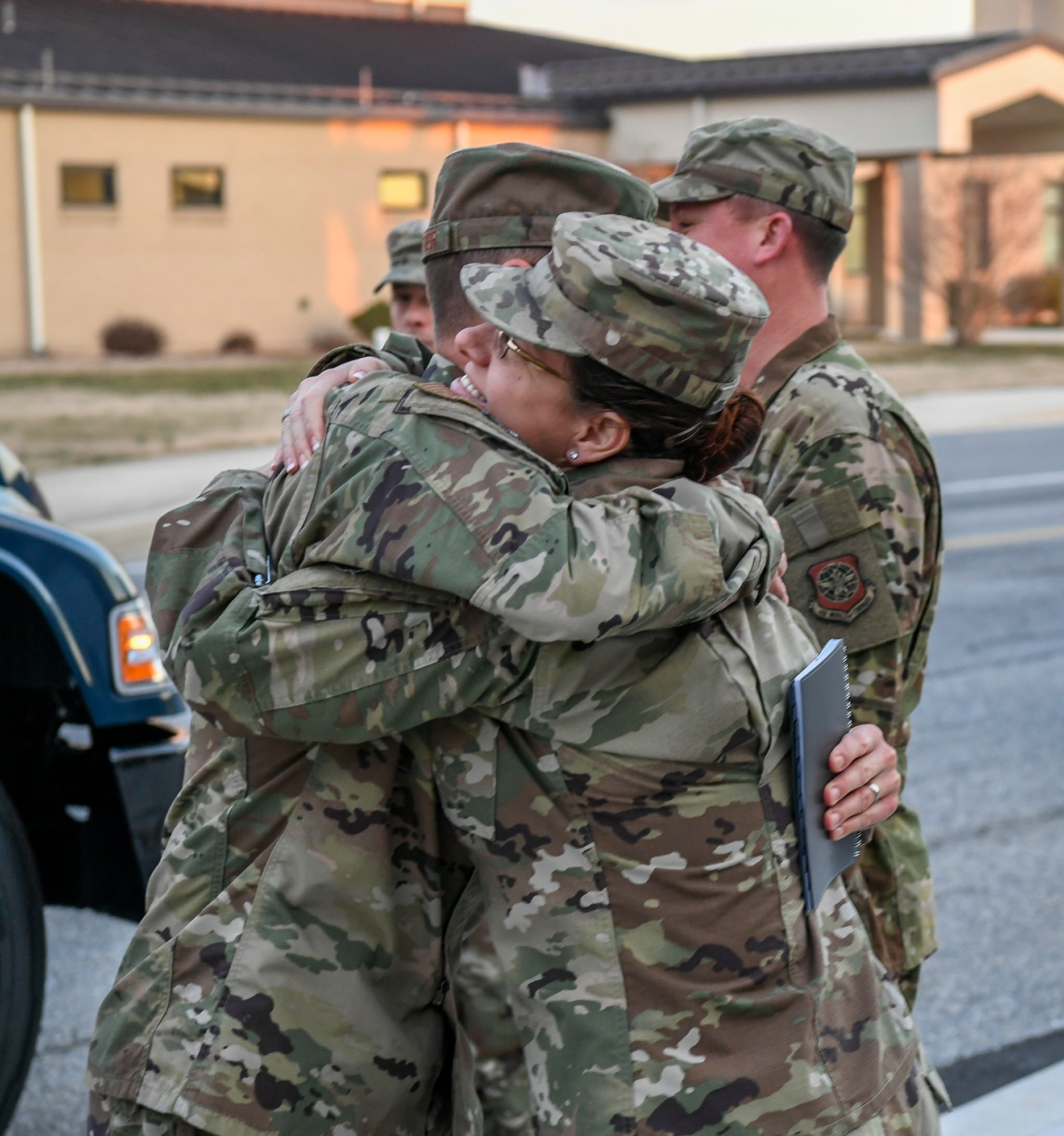 Chief Master Sgt. Michael Pelletier, 618th Air Operations Center command chief, and Chief Master Sgt. Shae Gee, 436th Airlift Wing command chief, greet each other Jan. 24, 2020, at Dover Air Force Base, Del. Gee was excited to see an old friend, Pelletier. (U.S. Air Force photo by Senior Airman Christopher Quail)