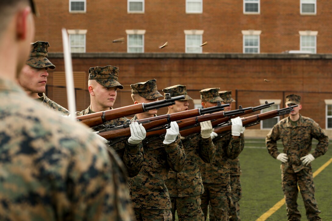 Marines with Alpha Company, Marine Barracks Washington, hone their precision drill during a firing party practice at Marine Barracks Washington, D.C., Jan. 23, 2020. The Marines rehearse the sequence every week in preparation for upcoming funerals at Arlington National Cemetery. (U.S. Marine Corps photo by Lance Cpl. Allen Sanders)