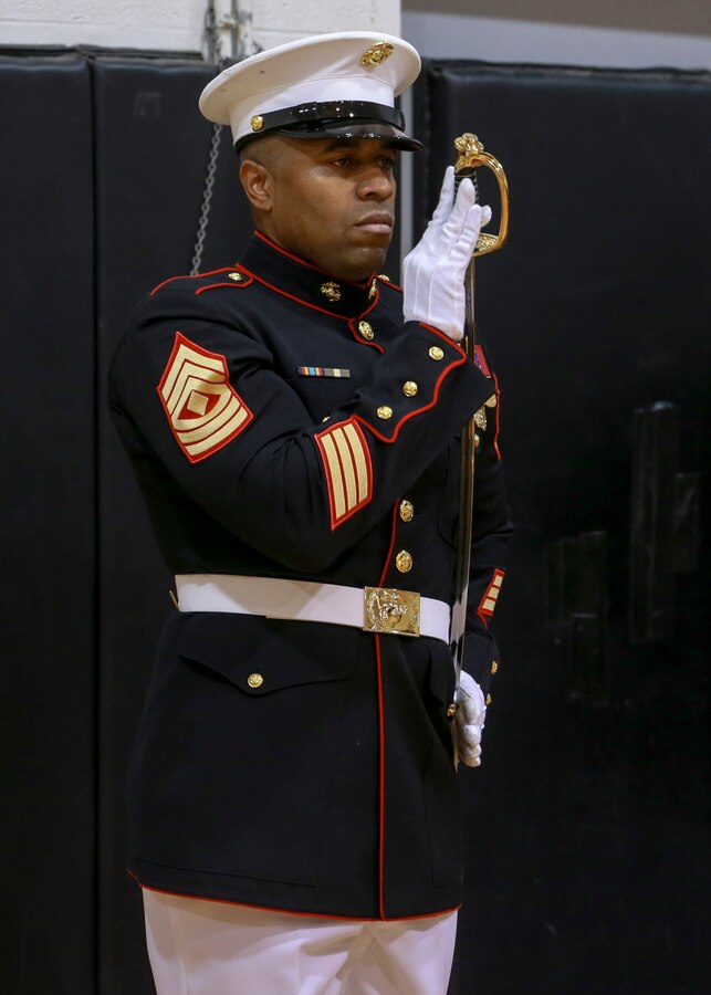 First Sgt. Christopher Johnson, company first sergeant, Bravo Company, Marine Barracks Washington, executes “return sword” during Ceremonial Drill School (CDS) evaluations at Marine Barracks Washington, D.C., Jan. 28, 2020. The three-week CDS course teaches Marines the fundamentals of ceremonial drill that is unique to the “Oldest Post of the Corps.” (U.S. Marine Corps photo by Lance Cpl. Allen Sanders)