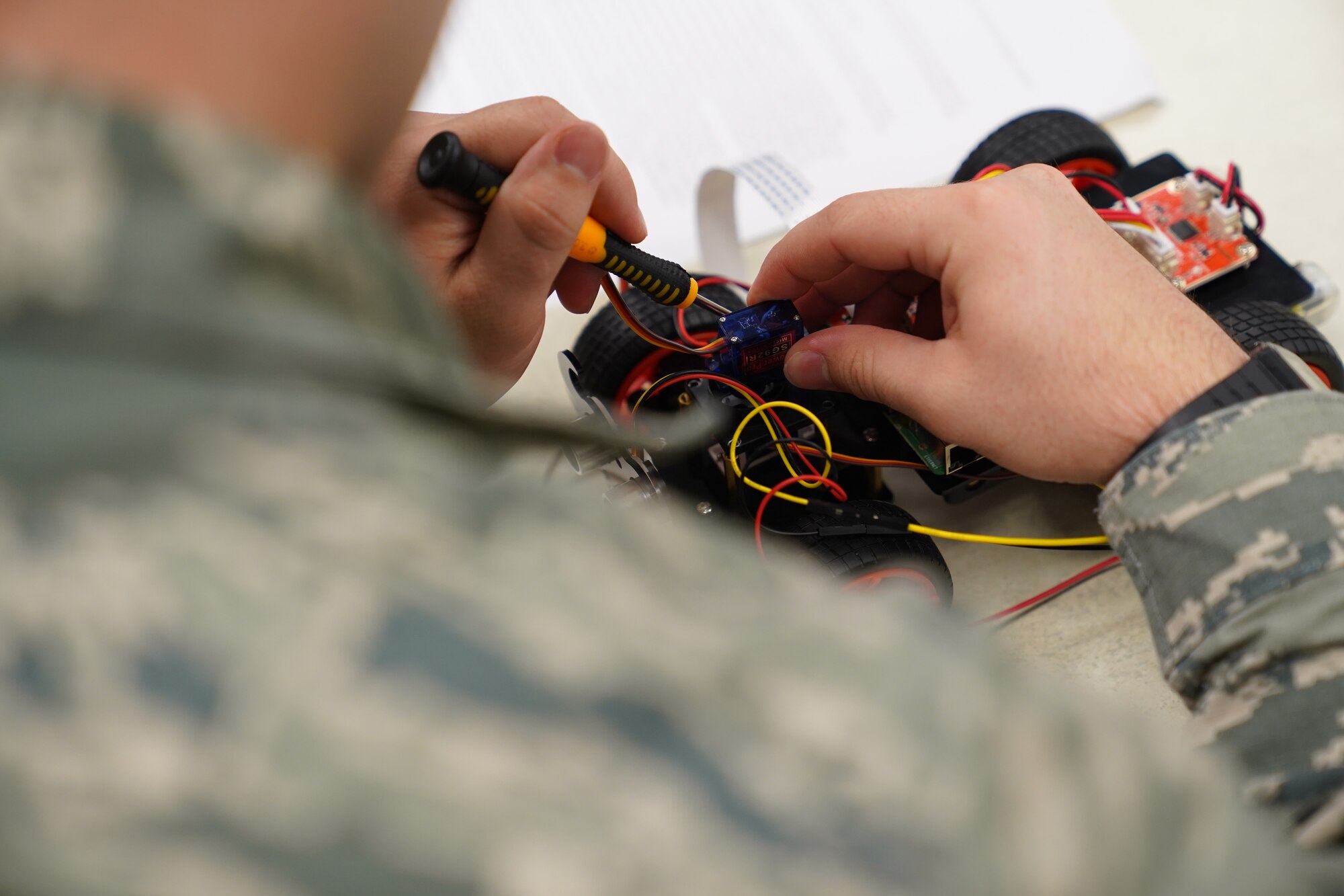 U.S. Air Force Airman Larry Wallace II, 336th Training Squadron student, works on an artificial intelligence project inside Thompson Hall at Keesler Air Force Base, Mississippi, Jan. 24, 2020. The Computer Enthusiasts Club is held to give Airmen an opportunity to connect and explore their creativity and curiosity. The class included computer programming projects with artificial intelligence, coding, and 3D printing. (U.S. Air Force photo Airman 1st Class Seth Haddix)