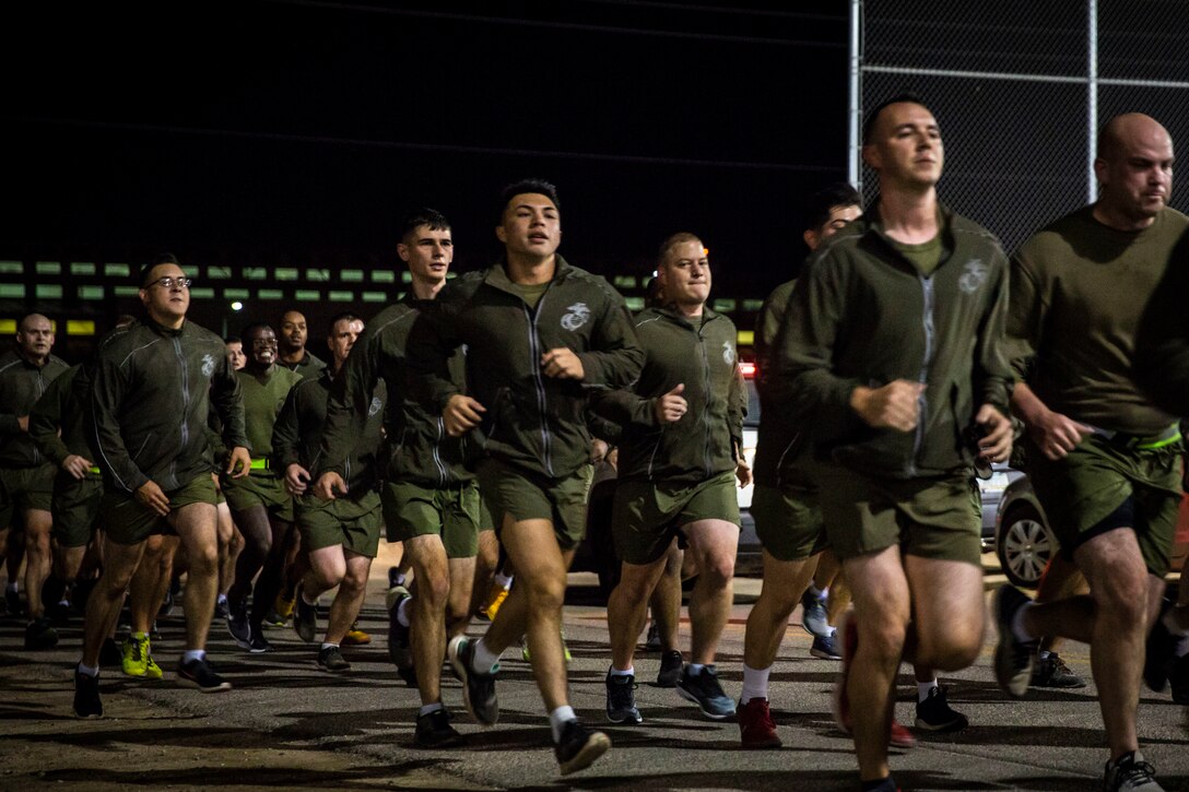 Marines and Sailors with Headquarters and Headquarters Squadron (H&HS) participate in a squadron run on Marine Corps Air Station (MCAS) Yuma, Ariz., Dec. 13, 2019. During the run, Marines and Sailors donated gifts to the Toys For Tots foundation (U.S. Marine Corps photo by Lance Cpl. Andres Hernandez)