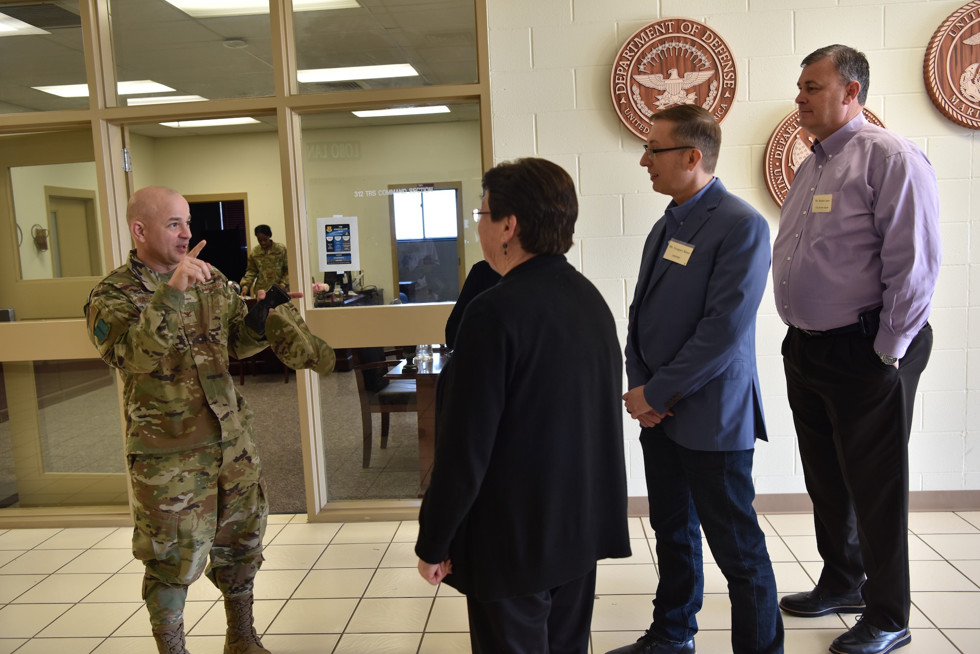 U.S. Air Force Col. Andres Nazario, 17th Training Wing commander, points out key features of the 312th Training Squadron at the Louis F. Garland Department of Defense Fire Academy, while hosting the Air Force Community Partnership Civic Partner Base Tour on Goodfellow Air Force Base, Texas, Jan. 23, 2020. The tour included visiting multiple buildings on base demonstrating what we do here with the ultimate goal of building on current community relations and creating new relationships. (U.S. Air Force photo by Staff Sgt. Chad Warren)