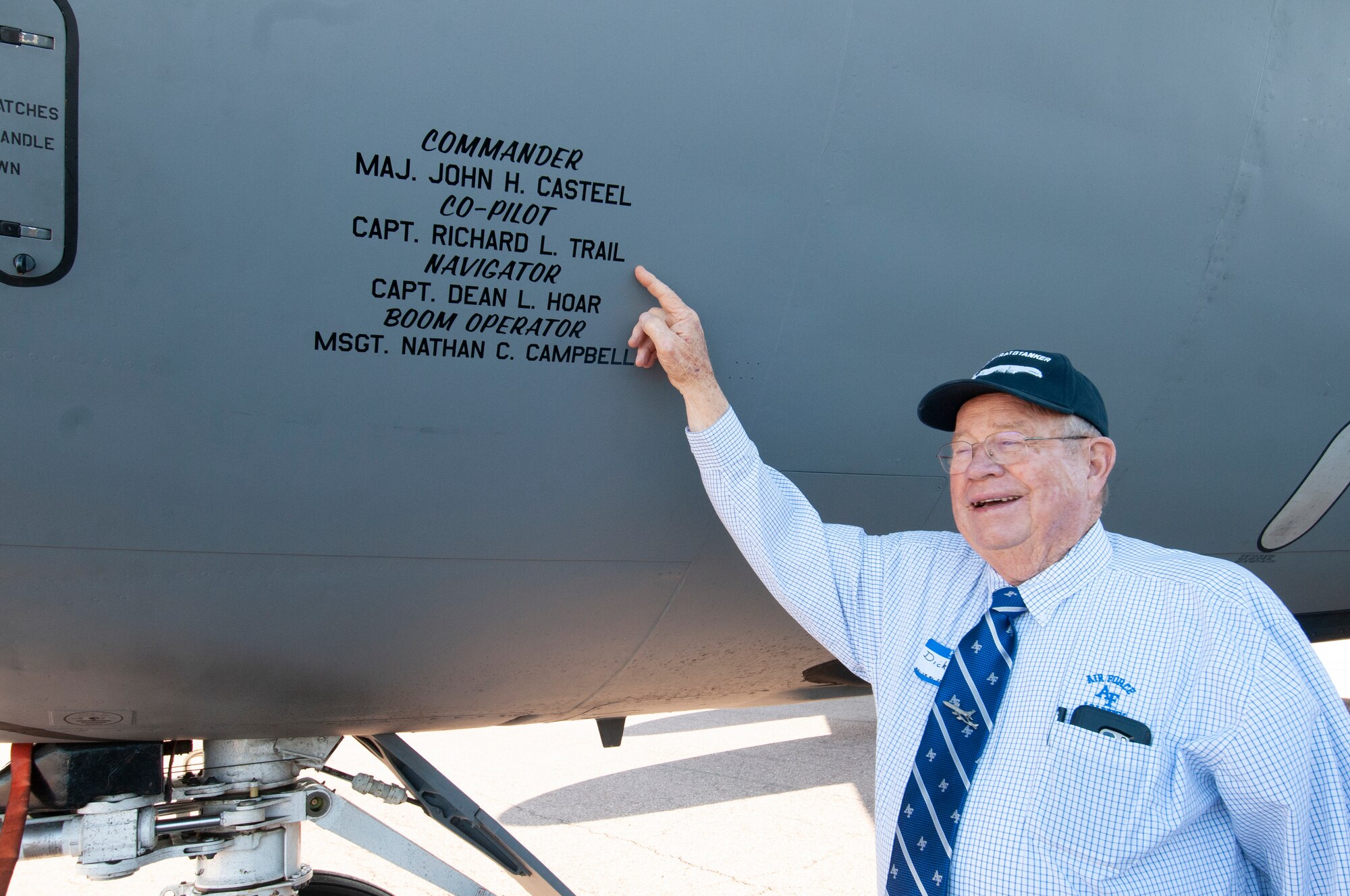 Retired Lt. Col. Richard “Dick” Trail points to the crew members of the 1967 Mackay Trophy award mission inscribed on the nose of KC-135 Stratotanker, tail number 60-0329, Oct. 2, 2019, Colorado Springs, CO.