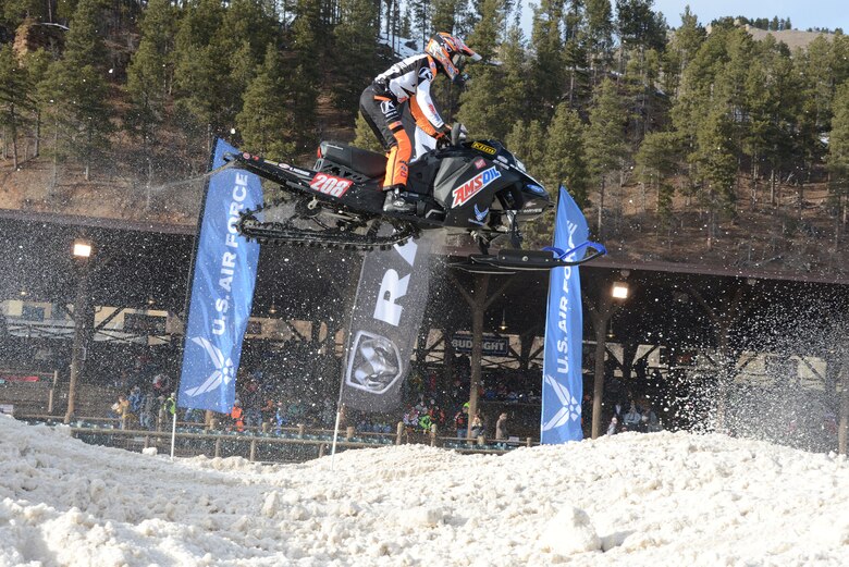 Air Force sponsored Snocross driver Lincoln Lemieux gets some serious air during qualifying for the U.S. Air Force Snocross National in Deadwood, South Dakota.