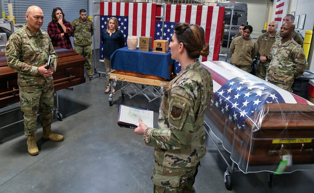 Master Sgt. Holly Roberts-Davis, Air Force Mortuary Affairs Operations public affairs, speaks to Brig. Gen. Jimmy Canlas, 618th Air Operations Center commander, Jan. 24, 2020, at Dover Air Force Base, Del. Roberts-Davis briefed Canlas about the burial options for fallen service members. (U.S. Air Force photo by Senior Airman Christopher Quail)
