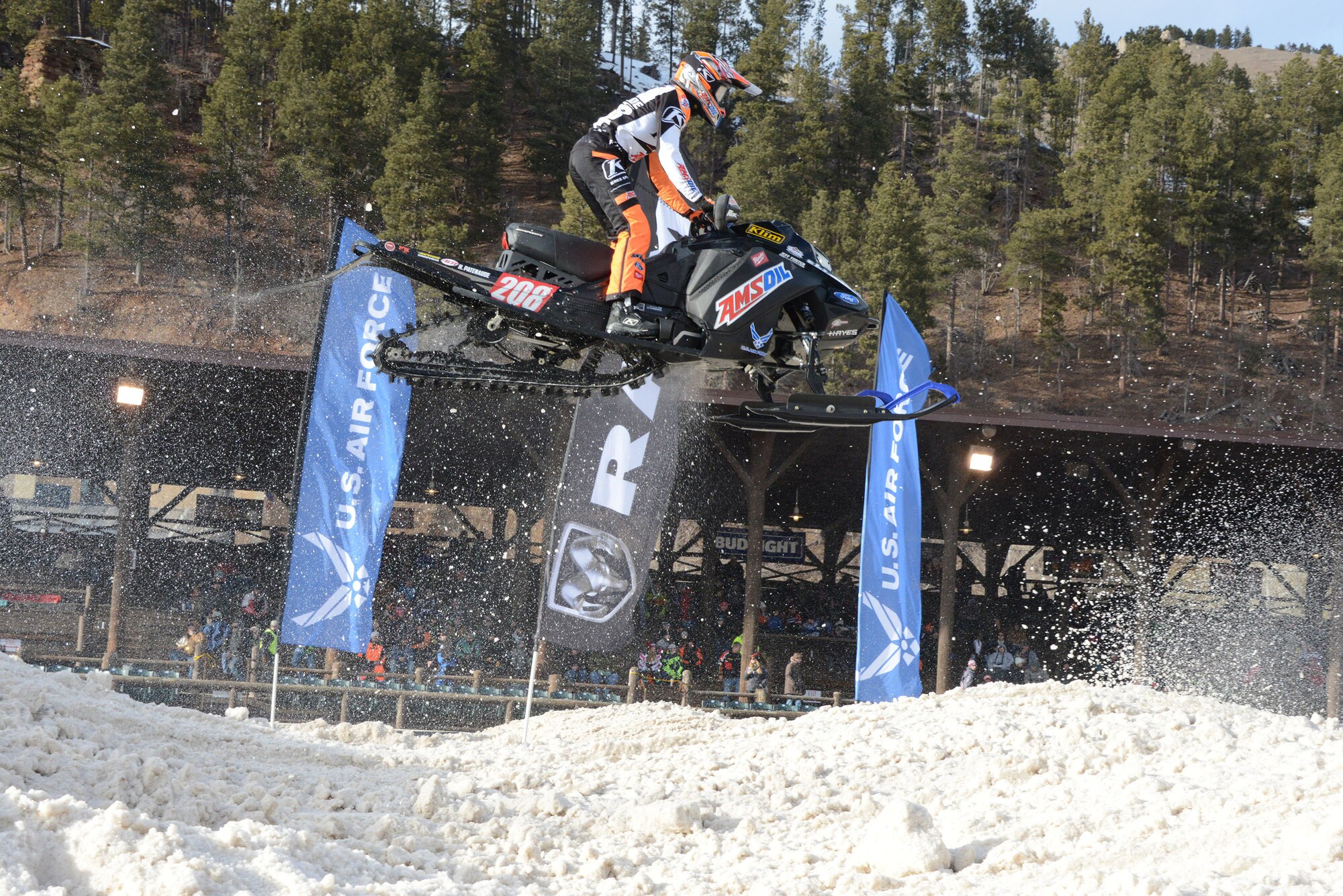 Air Force sponsored Snocross driver Lincoln Lemieux gets some serious air during qualifying for the U.S. Air Force Snocross National in Deadwood, South Dakota.