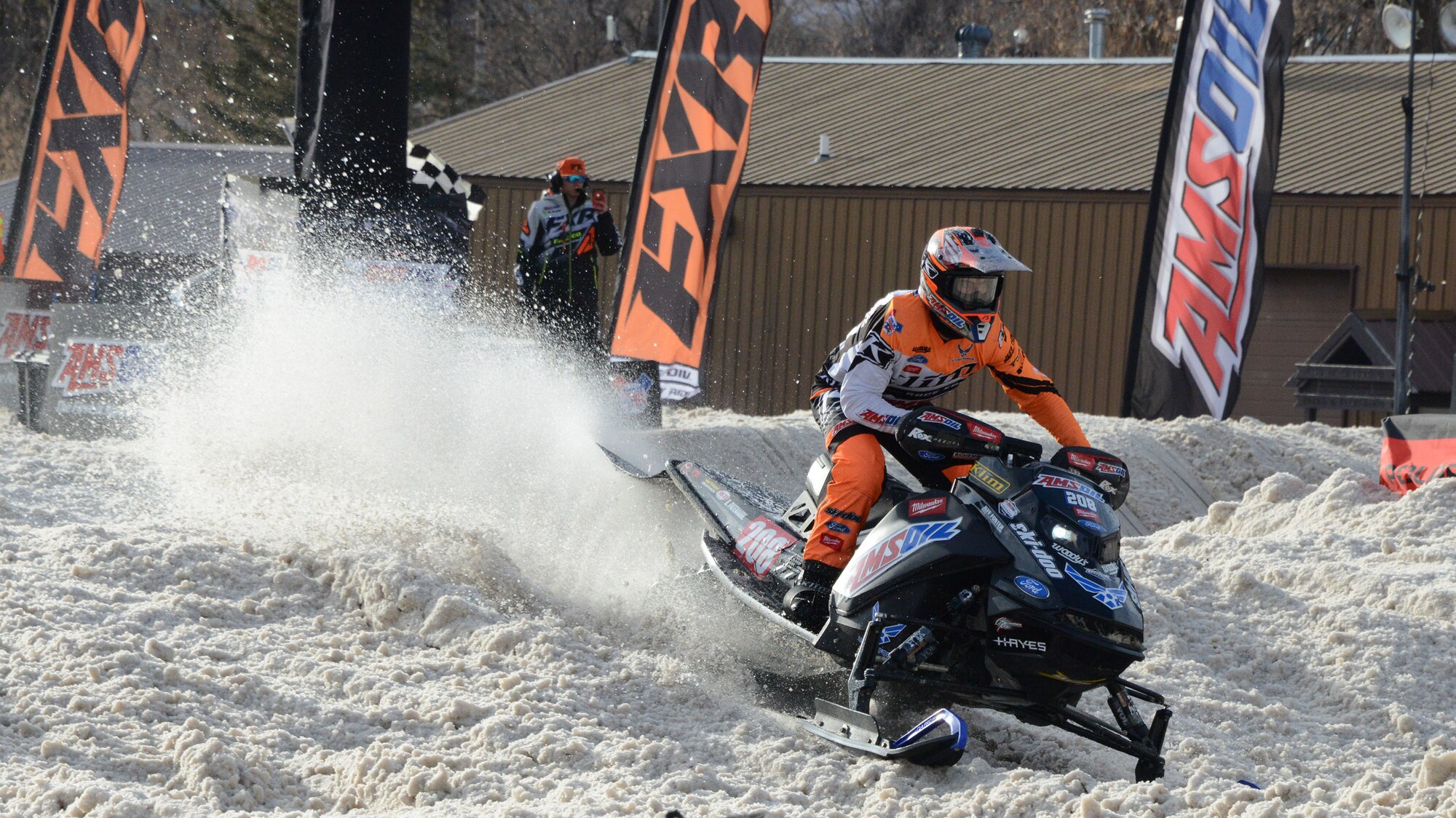 Air Force sponsored Snocross driver Hunter Patenaude, kicking out some snow while making it around the track during qualifying for the U.S. Air Force Snocross National in Deadwood, South Dakota.