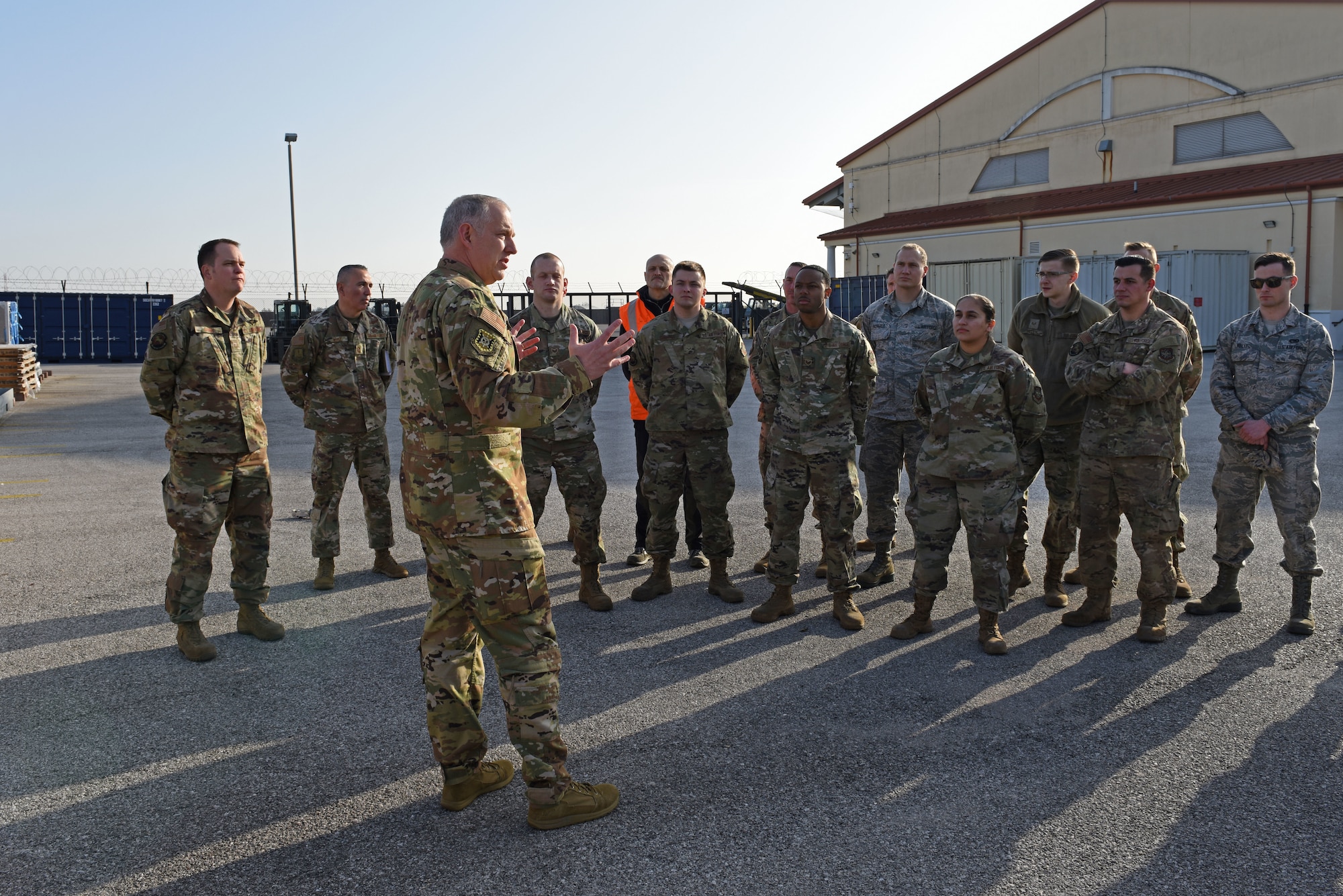 U.S. Air Force Maj. Gen. John Gordy, U.S. Air Force Expeditionary Center commander, speaks to Airmen from the 724th Air Mobility Squadron about their contributions to the mission during a site visit at Aviano Air Base, Italy, Jan. 24, 2020. The 724th AMS consists of a combat readiness flight, passenger and aircraft services section, air mobility control center and an air terminal operation center.
