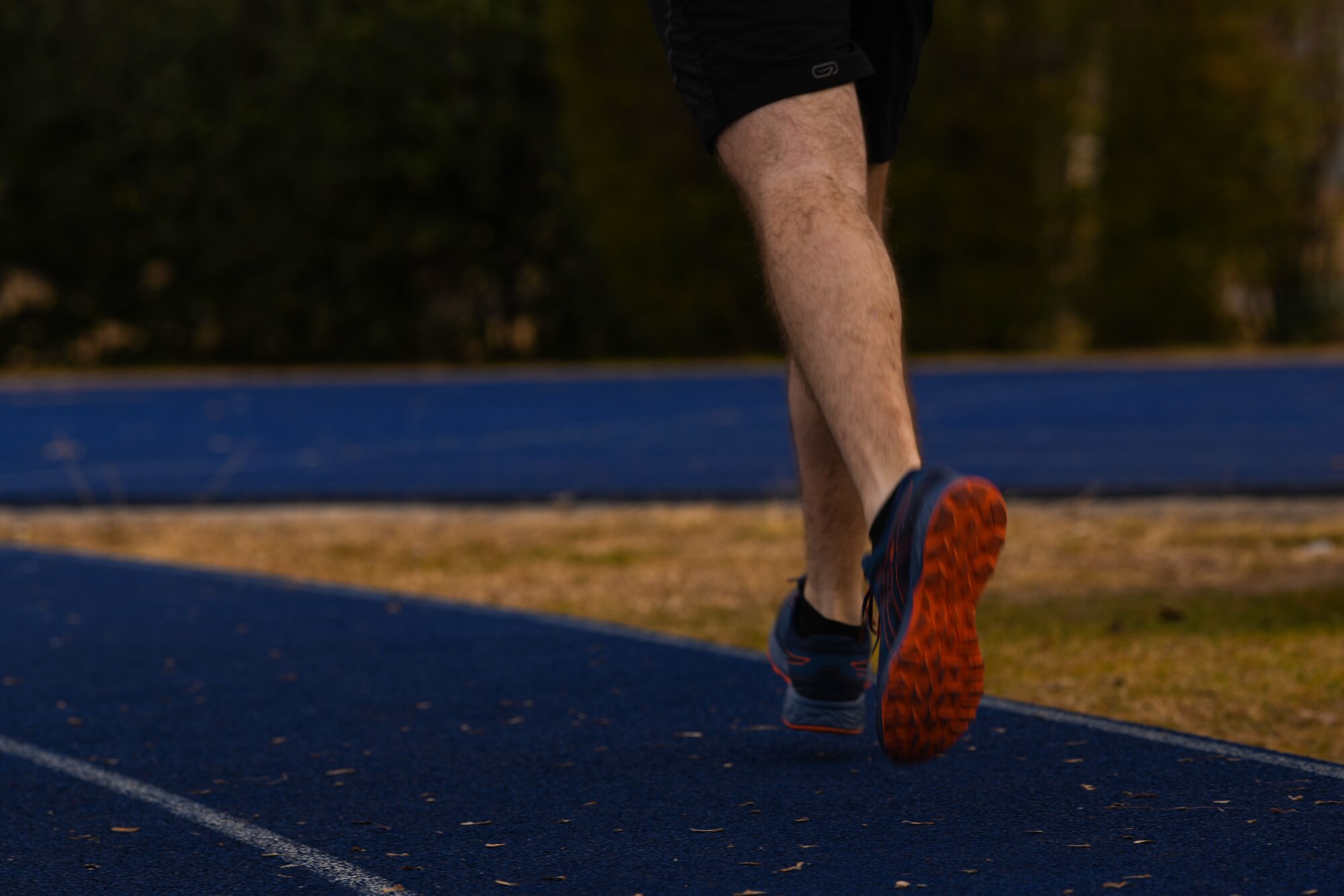 U.S. Air Force Airman 1st Class Dale Riehl, 31st Aircraft Maintenance Squadron, 56th Helicopter Maintenance Unit, helicopter tilt rotor maintainer, jogs two laps on a track at Aviano Air Base, Italy, Jan. 27, 2019. Airmen will receive age and gender-specific composite scores in a physical fitness assessment based on the following maximum component scores: 60 points for aerobic, 20 points for body composition, 10 points for push-ups and 10 points for sit-ups. (U.S. Air Force photo by Airman 1st Class Ericka A. Woolever)