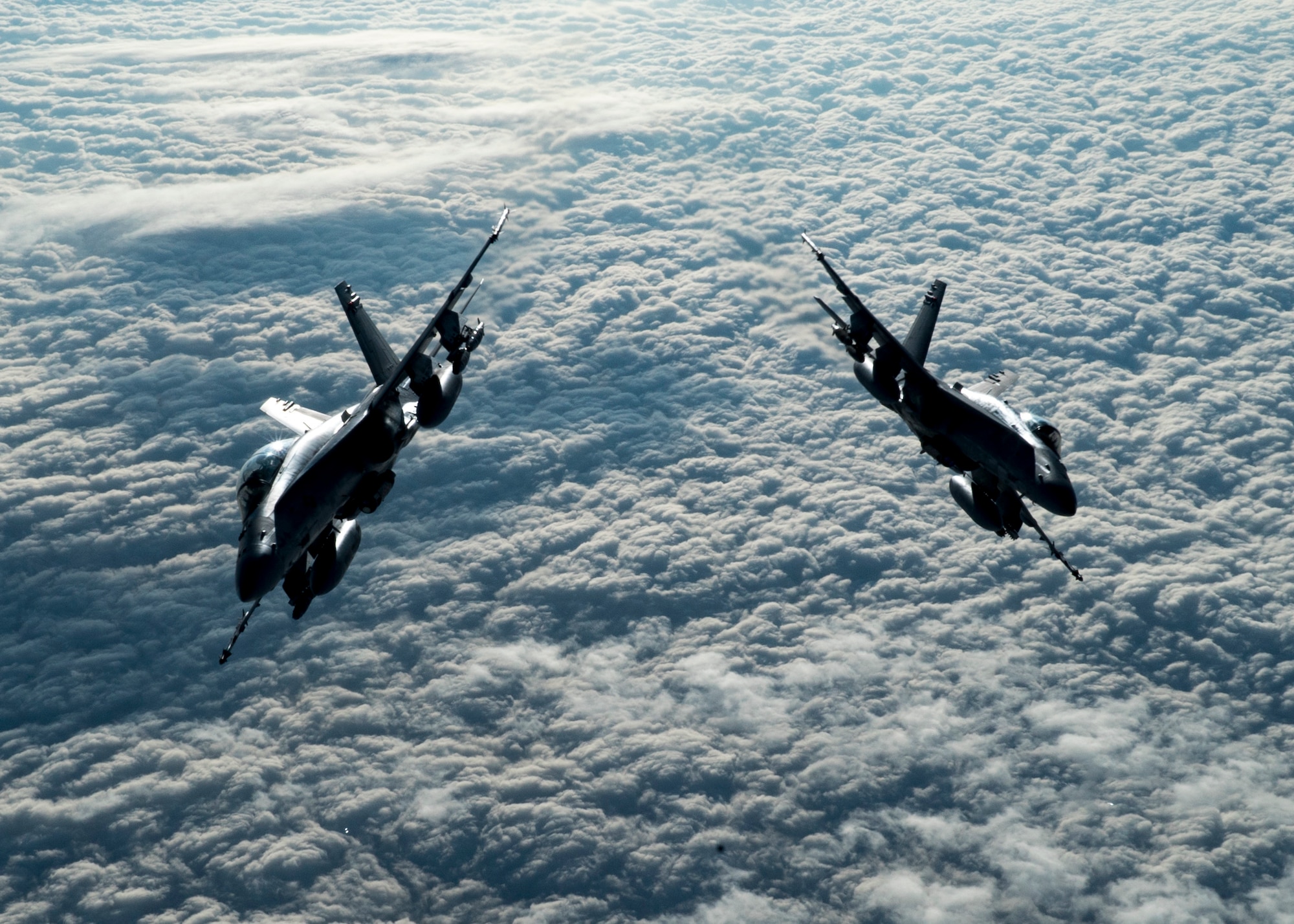 Two U.S Marine Corps F/A-18 Hornets assigned to the Marine Fighter Attack Squadron (VMFA) 251 fly over the U.S. Central Command area of responsibility, Jan. 22, 2020.