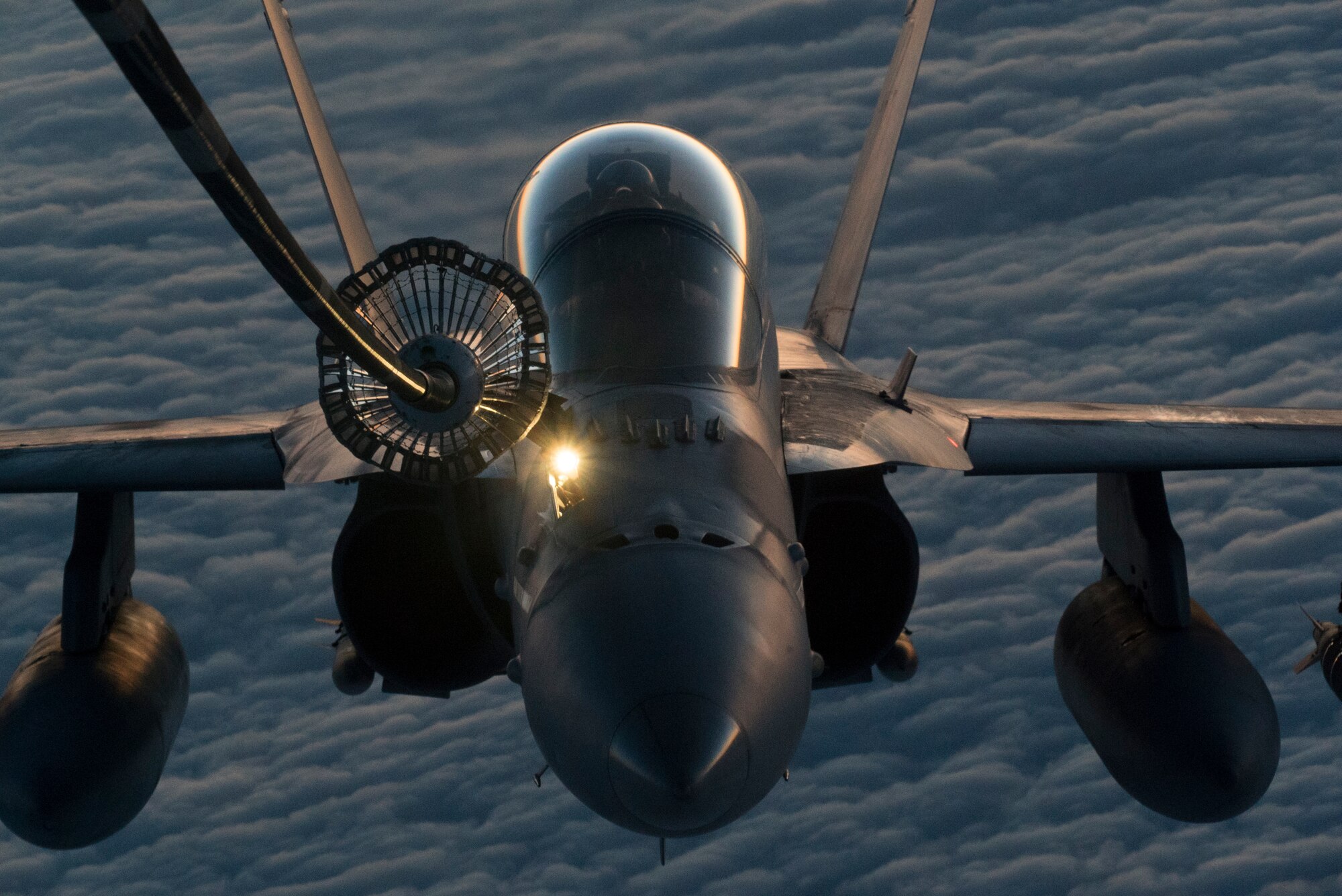 A U.S Marine Corps F/A-18 Hornet assigned to the Marine Fighter Attack Squadron (VMFA) 251 receives fuel from a KC-10 Extender assigned to the 908th Expeditionary Air Refueling Squadron over the U.S. Central Command area of responsibility, Jan. 22, 2020.