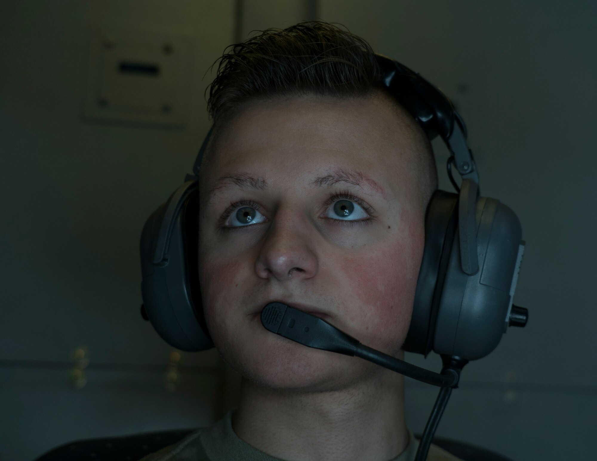 A U.S. Air Force in-flight refueling specialist assigned to the 908th Expeditionary Air Refueling Squadron performs preflight checks aboard a KC-10 Extender at Al Dhafra Air Base, United Arab Emirates, Jan. 22, 2020.