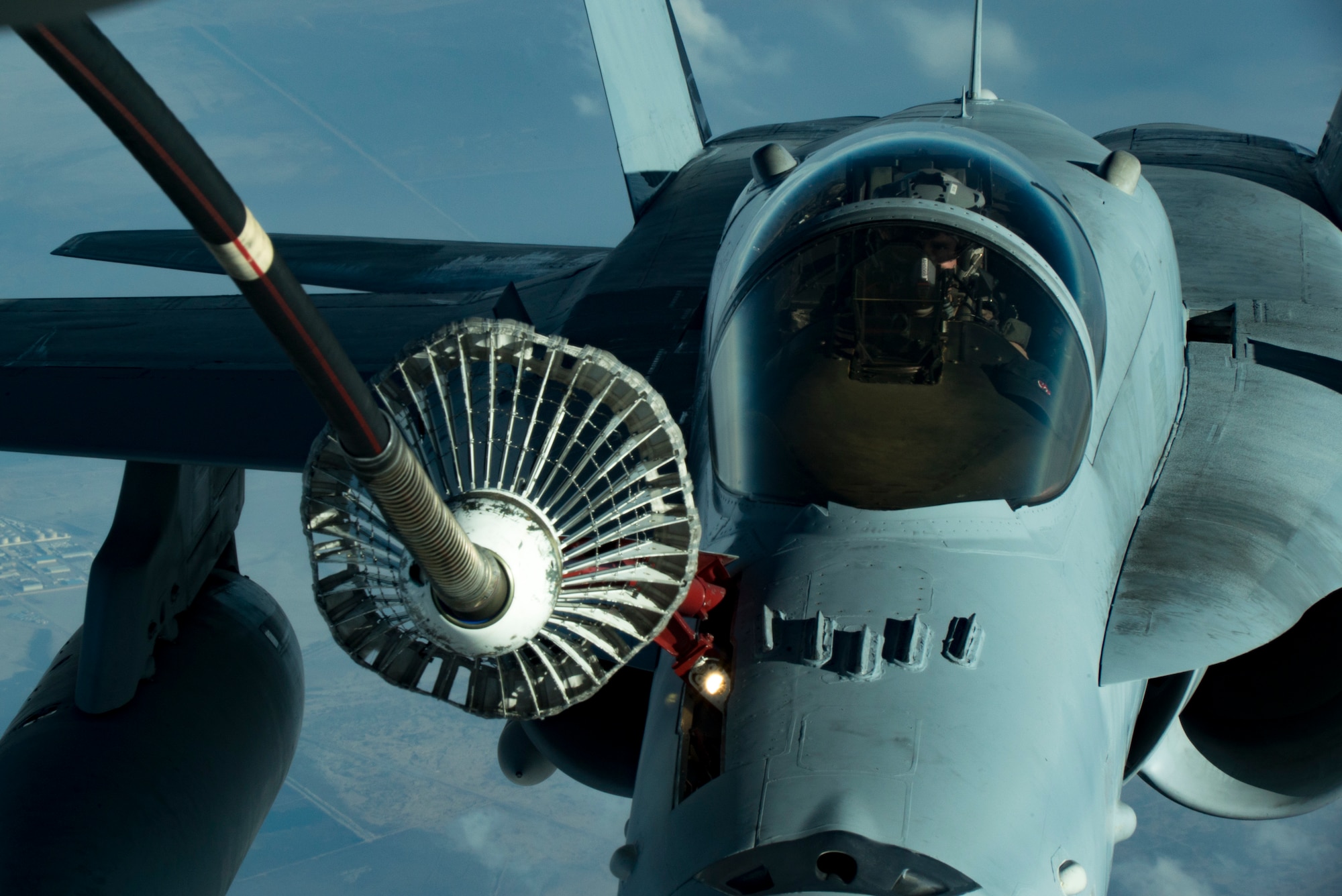 A U.S Marine Corps F/A-18 Hornet assigned to the Marine Fighter Attack Squadron (VMFA) 251 receives fuel from a KC-10 Extender assigned to the 908th Expeditionary Air Refueling Squadron over the U.S. Central Command area of responsibility, Jan. 22, 2020.