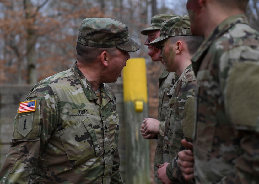 A U.S. Army Soldier yells to motivate initial entry training Soldiers during a field training exercise at Joint Base Langley-Eustis, Virginia, Jan. 24, 2020.