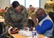 A U.S. Army Master Resilience Training course instructor helps a participant during the MRT course at Joint Base Langley-Eustis, Virginia, Jan. 28, 2020.