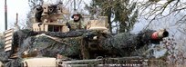 A Soldier remains vigilant from atop his tank during Combined Resolve XIII at The Joint Multinational Readiness Center in Hohenfels, Germany on January 24, 2020. At this training, allied and partner troops practice battle scenarios to hone their skills in a real-world training environment.