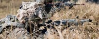 U.S. Army Pvt. Royce Wilkinson and Pfc. Austin Byrd, of Delta Company, 2nd Battalion, 3rd Combat Aviation Brigade, secure the perimeter of the airfield on Hohenfels Training Area during Combined Resolve XIII. Jan. 27, 2020.