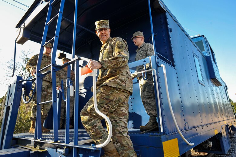 Brig. Gen. Richard W. Gibbs, Air Mobility Command Logistics, Engineering and Force Protection director, steps onto a train at Joint Base Charleston, S.C., Jan. 28, 2020.