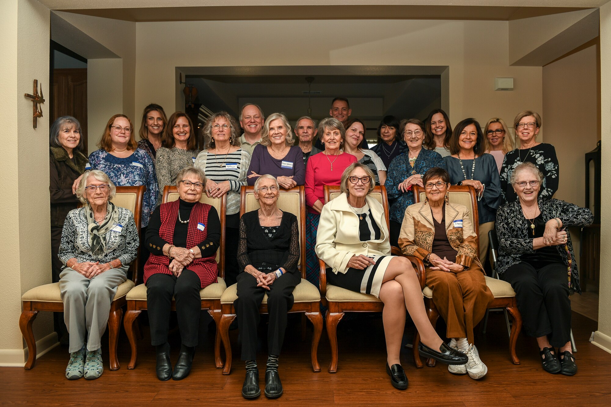 Many people pose for a group photo