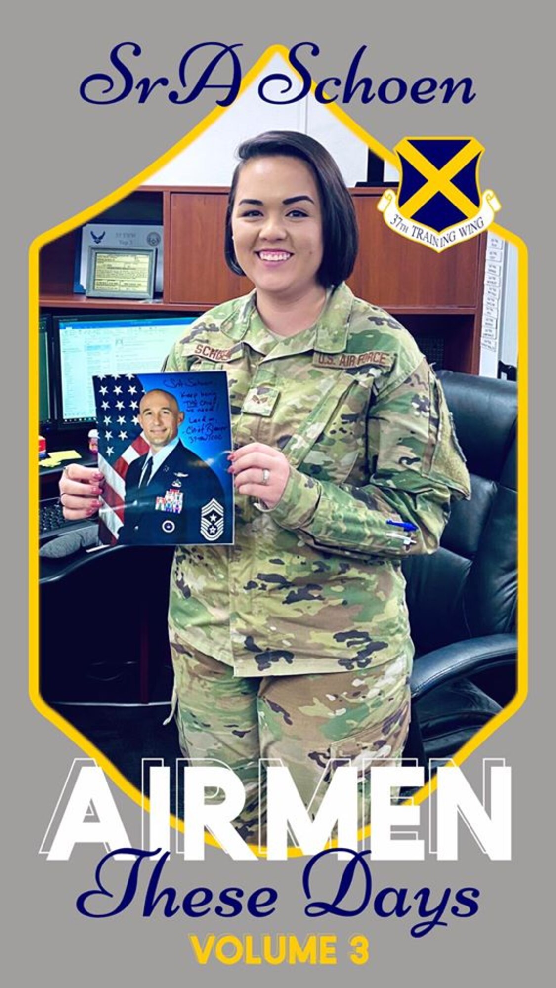 Senior Airman Jordyn Schoen holds the official photo of 37th Training Wing Command Chief, Chief Master Sgt. Stefan Blazier to motivate her to one day become a command chief herself.