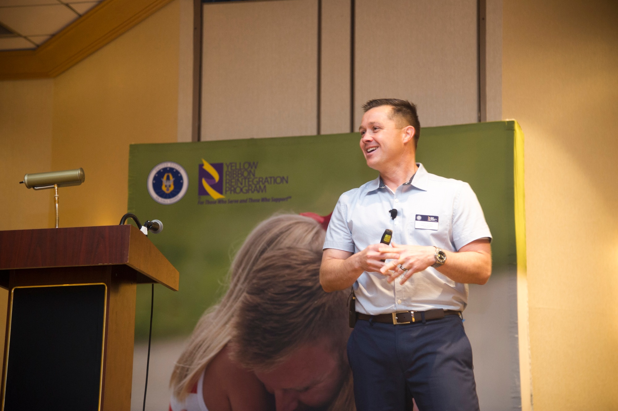 Photo of Lieutenant colonel Todd Riddle talking to pre- and post- deployers and their loved ones about stress Jan. 25 at an Air Force Reserve Yellow Ribbon Reintegration Program event in Orange County, California.