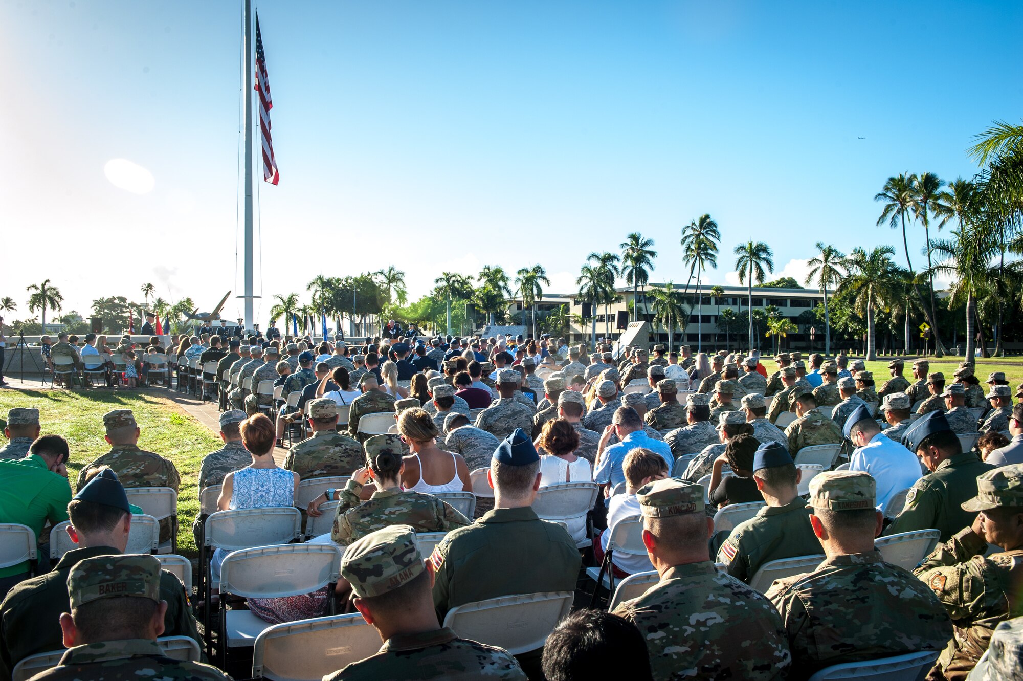 Airmen from the 15th and 154th Wings, family members and honored guests observe the Hickam Field Dec. 7th Remembrance Ceremony at Atterbury Circle, Joint Base Pearl Harbor-Hickam, Hawaii, Dec. 7, 2019. More than 100 military members, veterans and family members attended the ceremony to honor and remember the Airmen who lost their lives during the two waves of attacks by Japan on Dec. 7, 1941