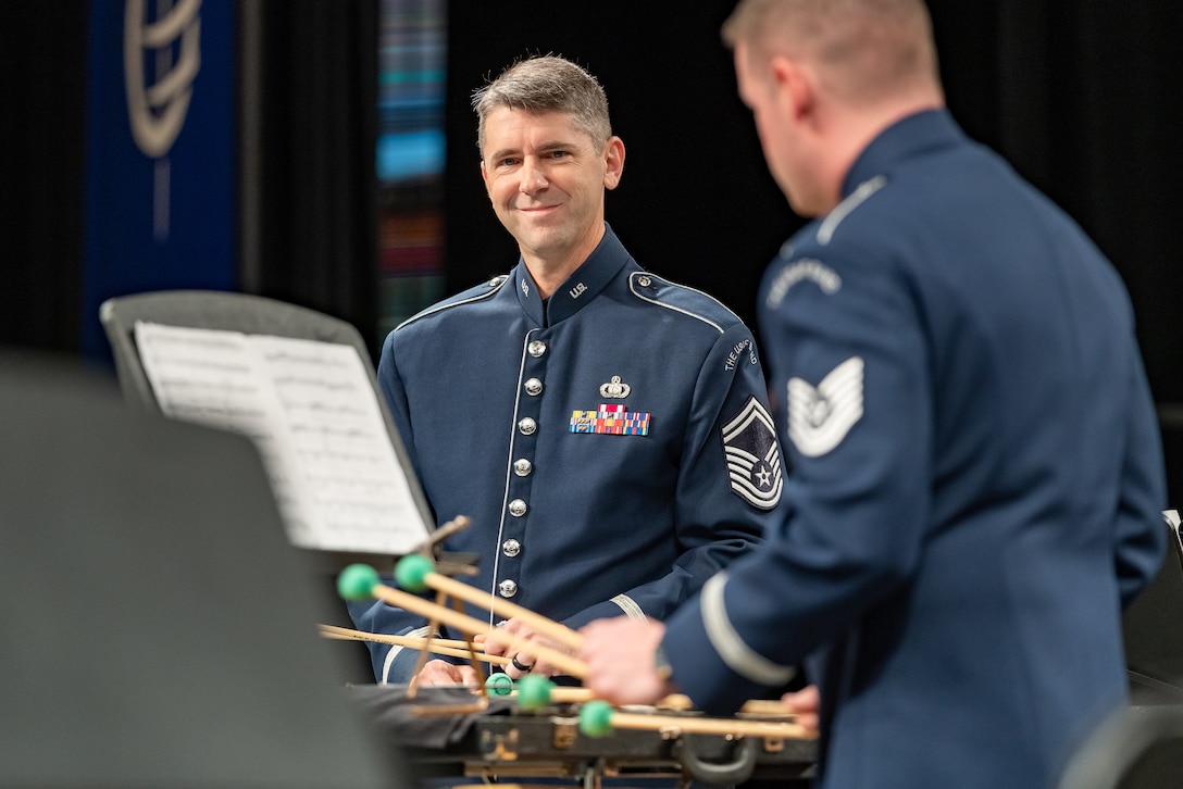 Two members of the percussion section from The U.S. Air Force Concert Band perform during a chamber music concert at The Midwest Clinic in Chicago, Illinois, on Dec. 18, 2019. The Midwest Clinic International Band, Orchestra and Music Conference brings together musicians, educators and people passionate about music education of all skill levels in Chicago each year for the largest music conference of its kind. (U.S. Air Force Photo by Master Sgt. Josh Kowalsky)