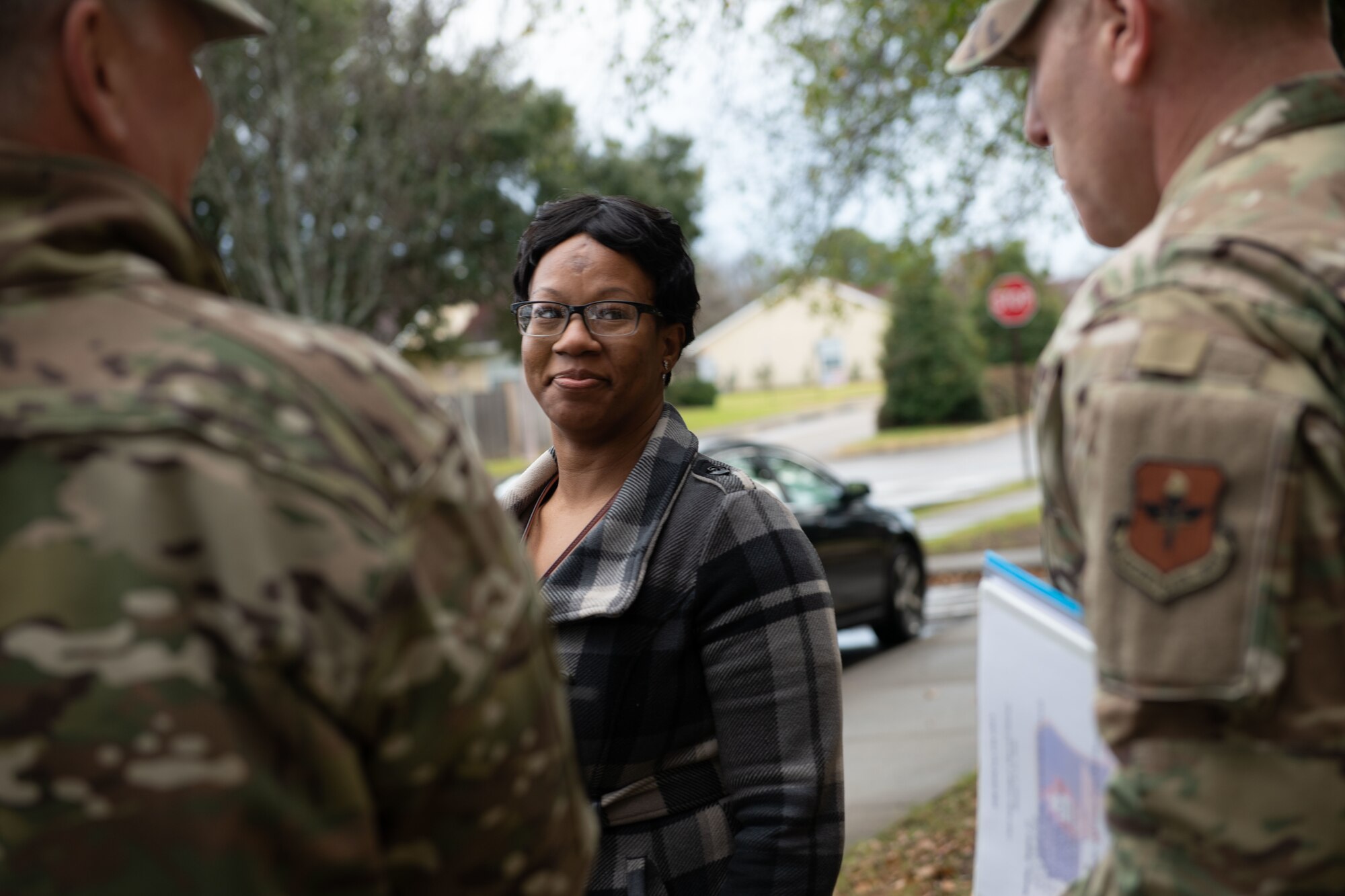Kaneshia Pickens, dorm manager, speaks with the command teams from Air Education and Training Command, Air University and the 42nd Air Base Wing during their arrival to tour the dorms, Jan. 29, 2020 at Maxwell Air Force Base, Alabama. During their visit, the command teams toured the rooms of two Airmen and other dorm amenities. (U.S. Air Force photo by Senior Airman Alexa Culbert)
