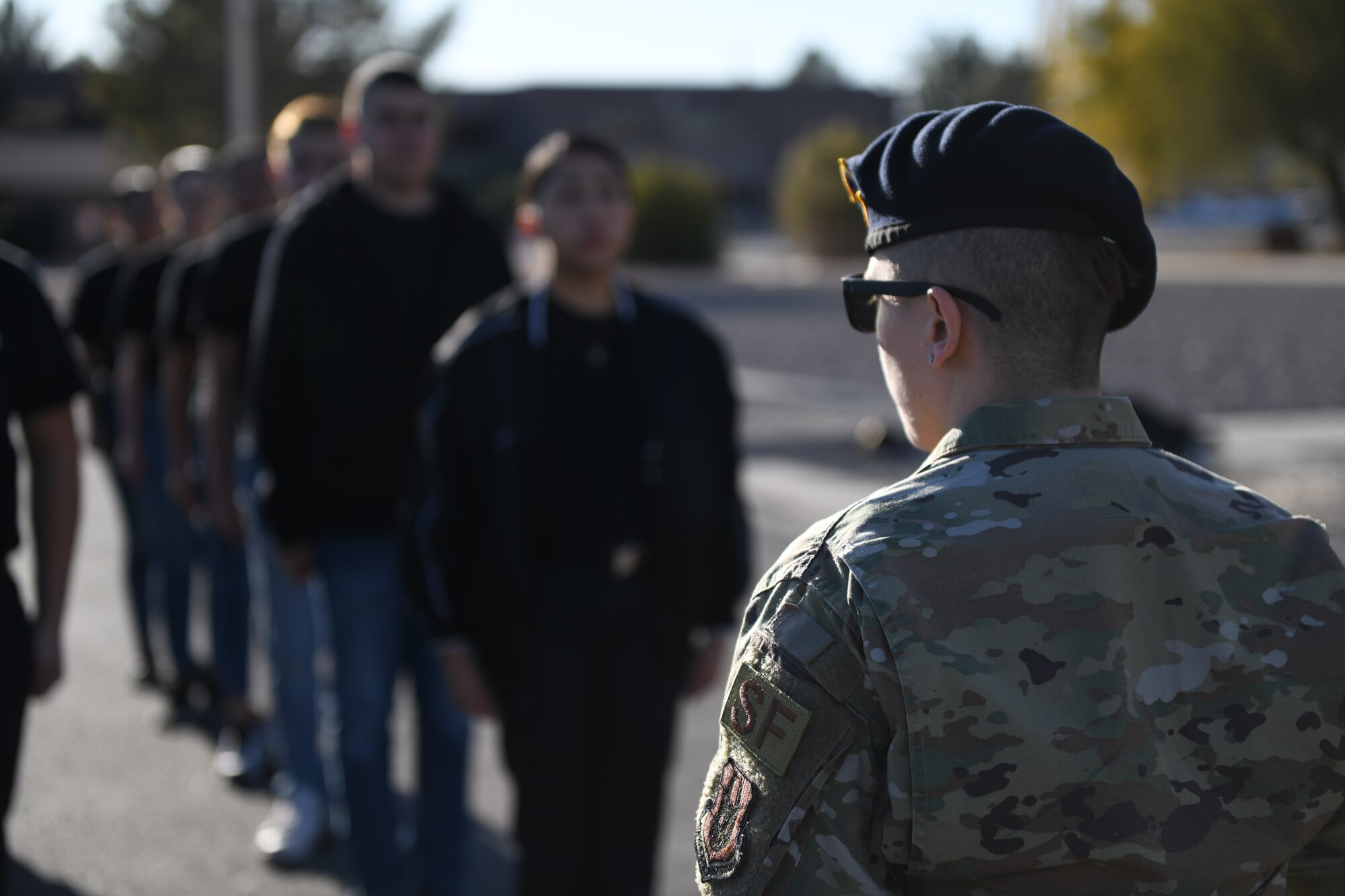 Tech. Sgt. Sabrina Yeghiazarian, flight chief, 926th Wing Development and Training Flight, instructs student flight trainees on proper Air Force formation, Jan. 11, 2020, at Nellis Air Force Base, Nevada (U.S. Air Force photo by Natalie Stanley)