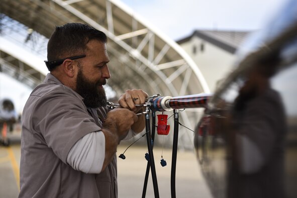 T-38 Talon mechanic works on aircraft