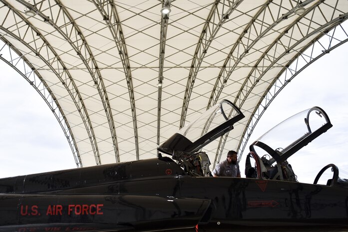 T-38 Talon mechanic works on aircraft