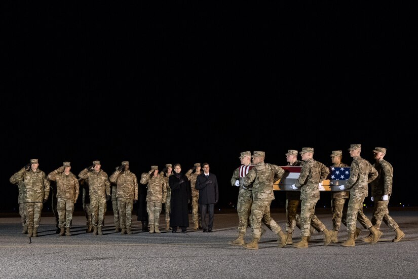 A U.S. Air Force carry team transfers the remains of Capt. Ryan S. Phaneuf, of Hudson, N.H., during a dignified transfer Jan. 30, 2020, at Dover Air Force Base, Del. Phaneuf was assigned to the 37th Bomb Squadron, Ellsworth Air Force Base, S.D. (U.S. Air Force photo by Roland Balik)
