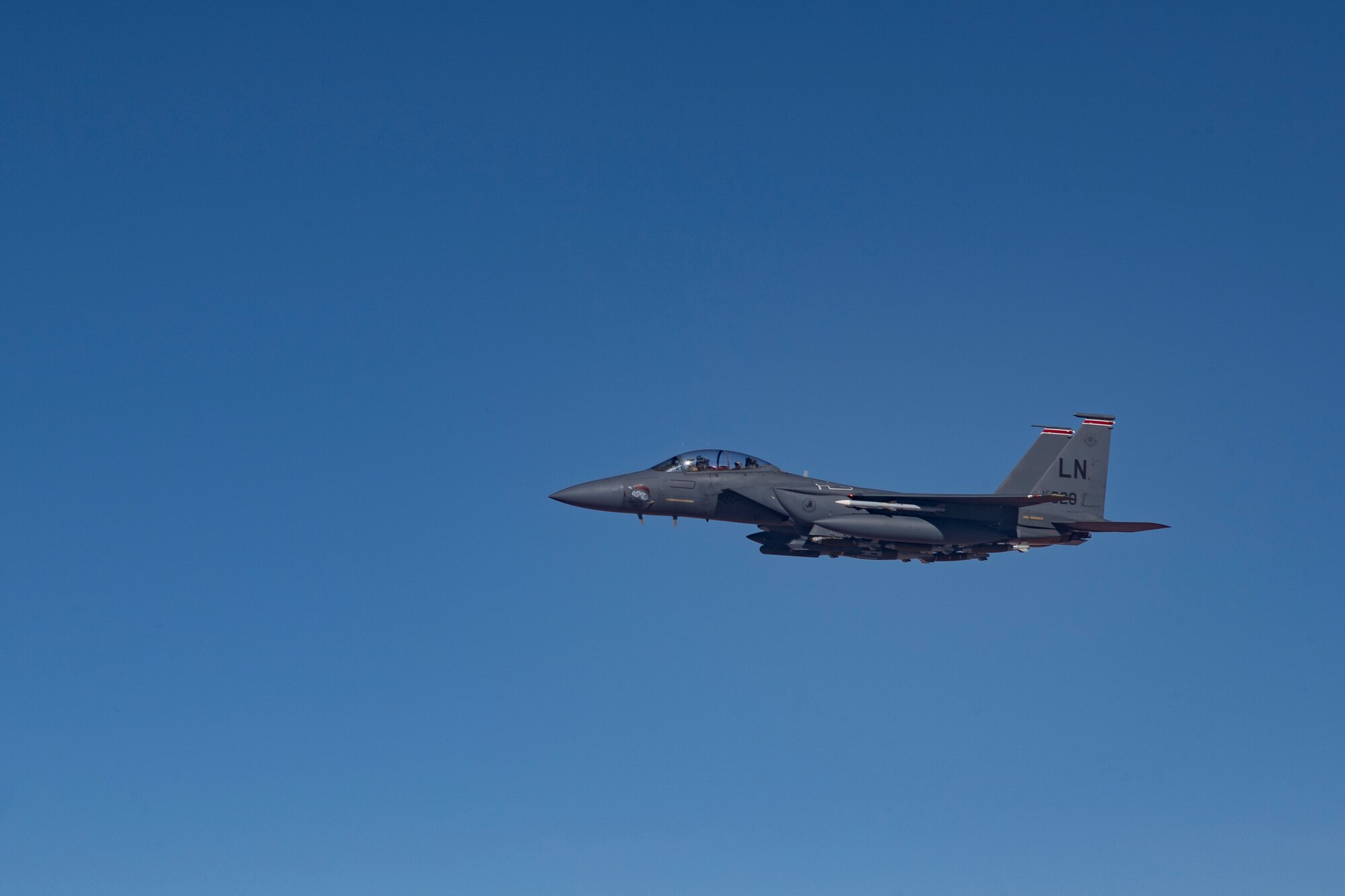 A U.S. Air Force F-15E Strike Eagle assigned to the 494th Expeditionary Fighter Squadron flies above the U.S. Central Command area of responsibility, Jan. 19, 2020.